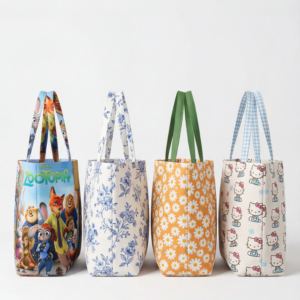 Collection of custom canvas tote bags with assorted pattern designs